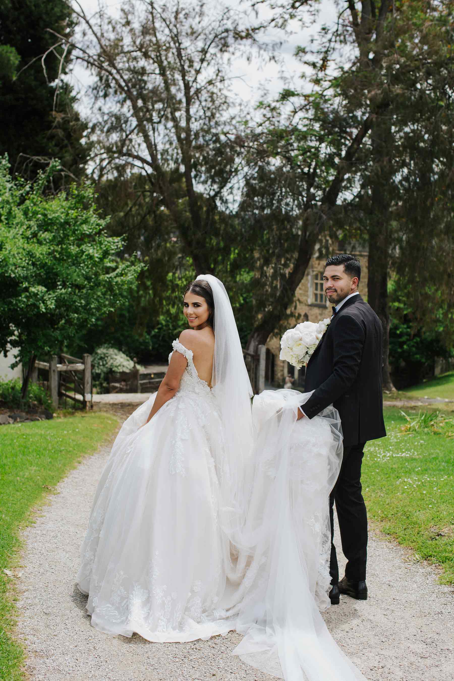 Yola + Alexander RC Real Bride Wearing Demetrios Platinum ballgown in 'ANASTASIA'
