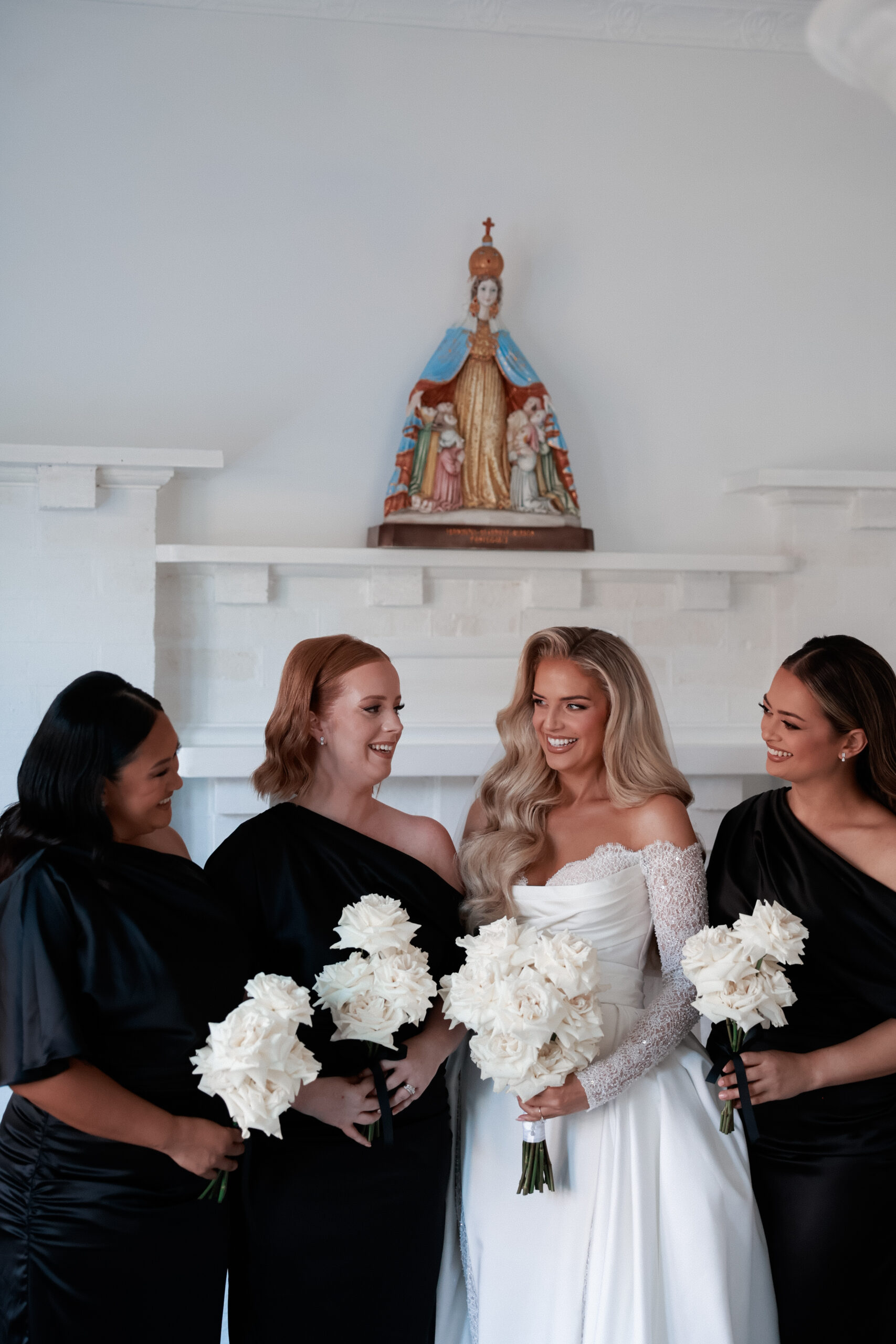 Bride standing next to her bridesmaids