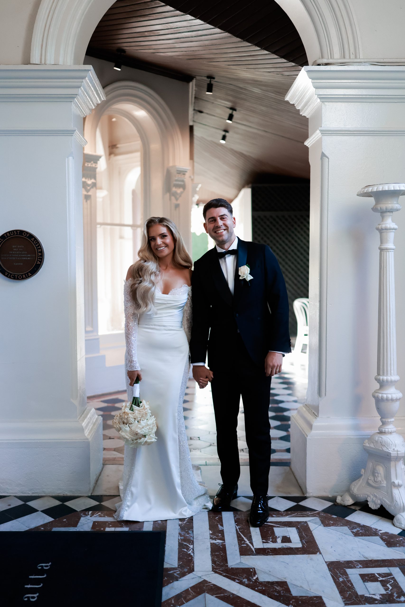 bride and groom posing for wedding photos