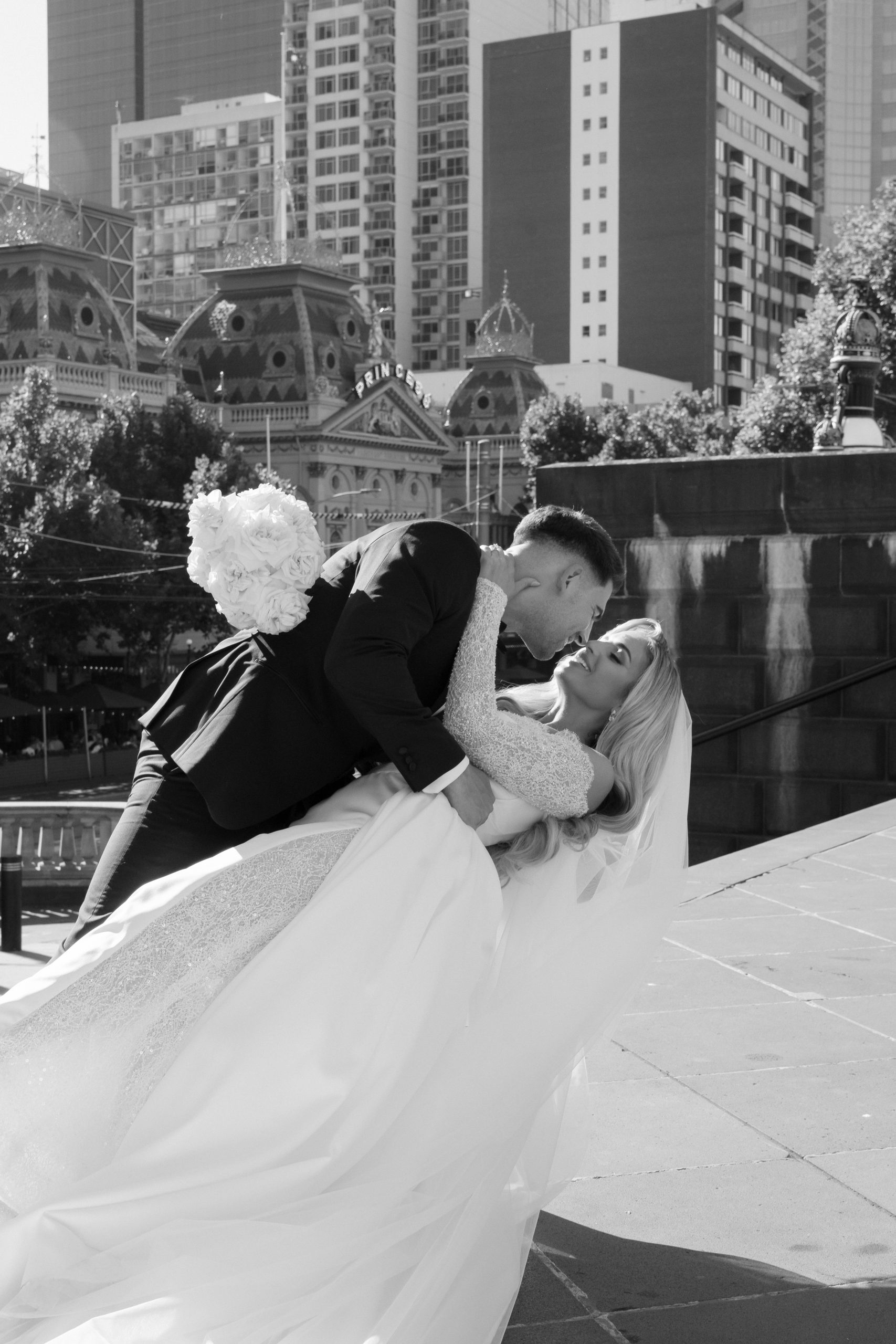 Bride and groom about to kiss. 
