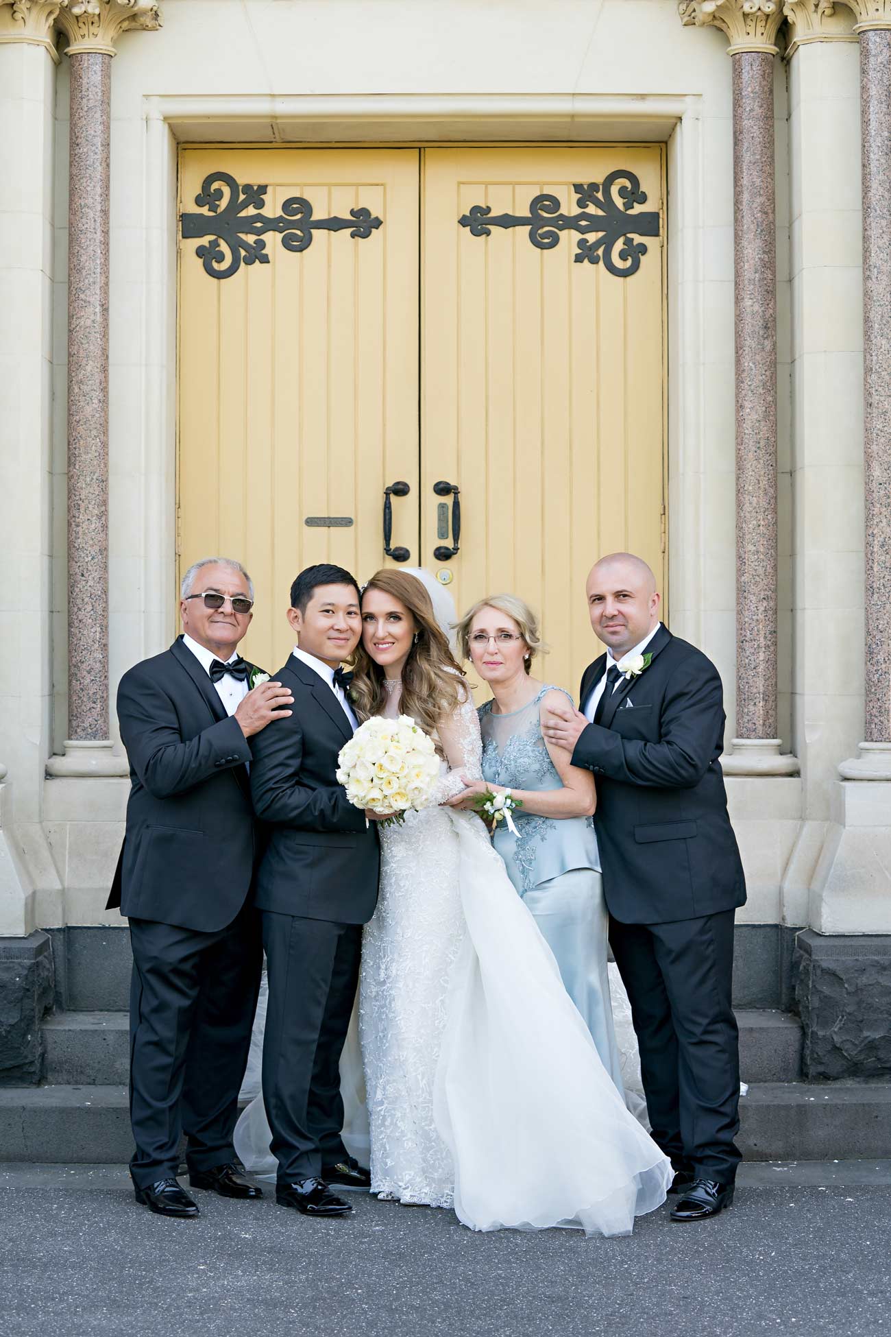 Melina + Vuong RC Real Bride Wearing Demetrios Platinum Wedding dress in 'Analisa'