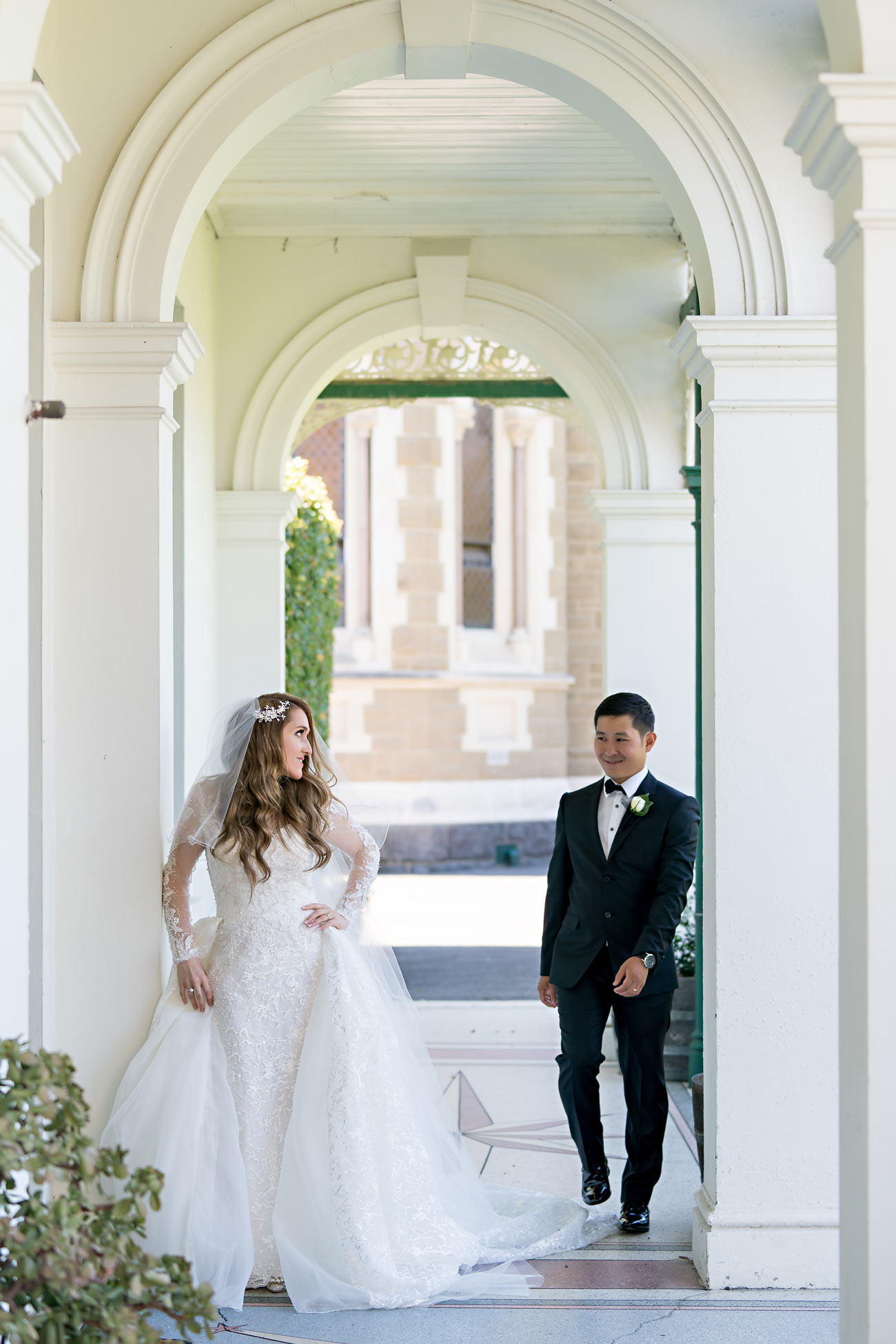 Melina + Vuong RC Real Bride Wearing Demetrios Platinum Wedding dress in 'Analisa'