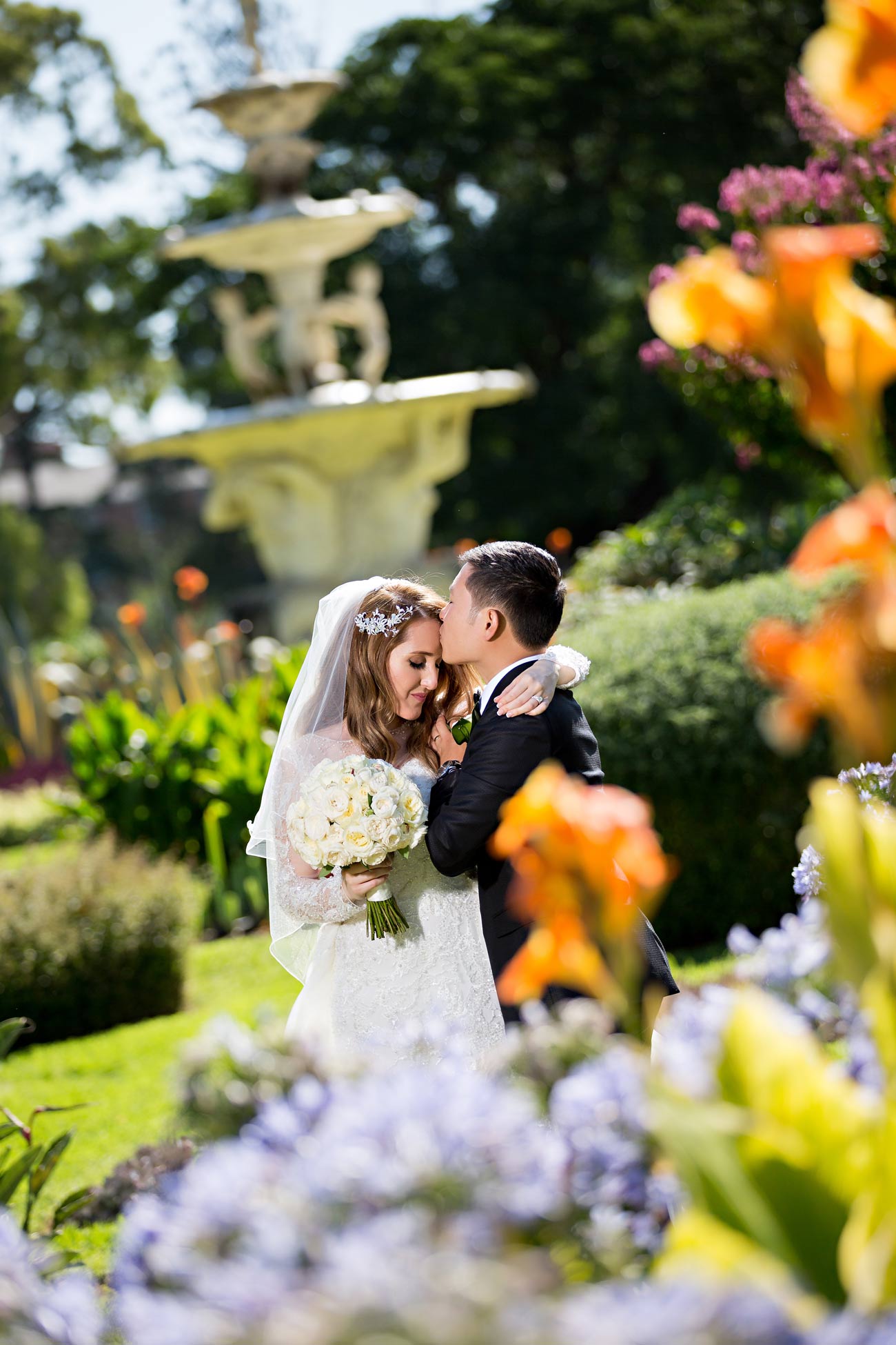 Melina + Vuong RC Real Bride Wearing Demetrios Platinum Wedding dress in 'Analisa'