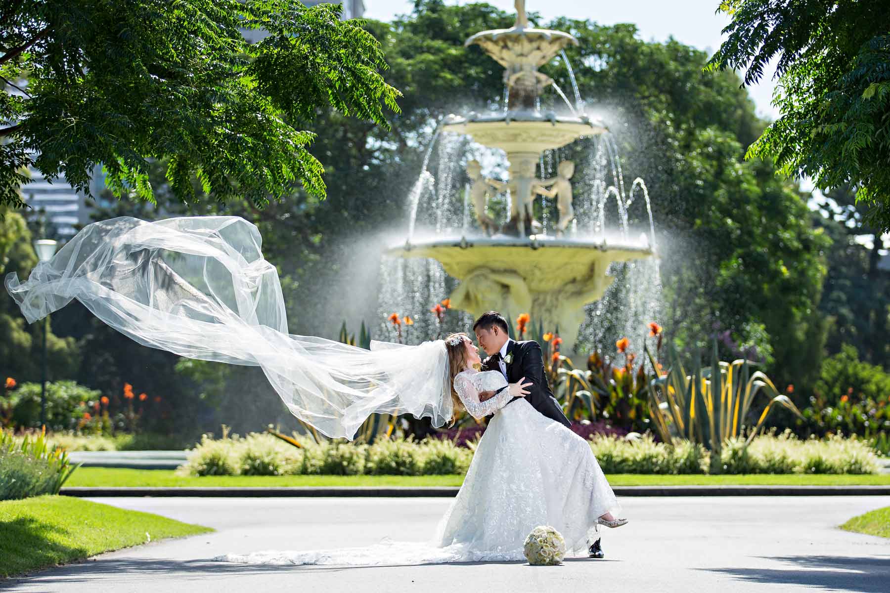 Melina + Vuong RC Real Bride Wearing Demetrios Platinum Wedding dress in 'Analisa'