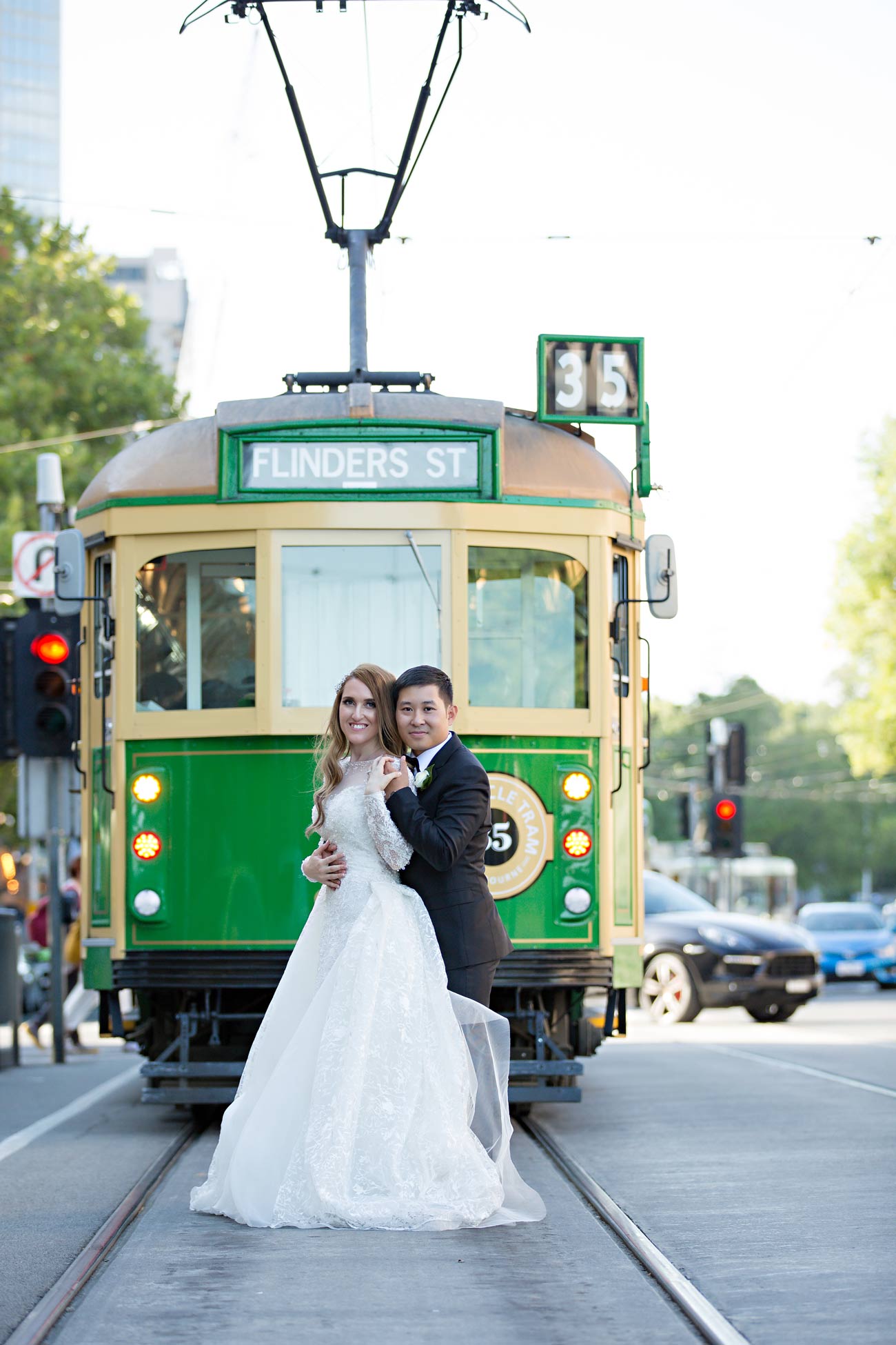 Melina + Vuong RC Real Bride Wearing Demetrios Platinum Wedding dress in 'Analisa'