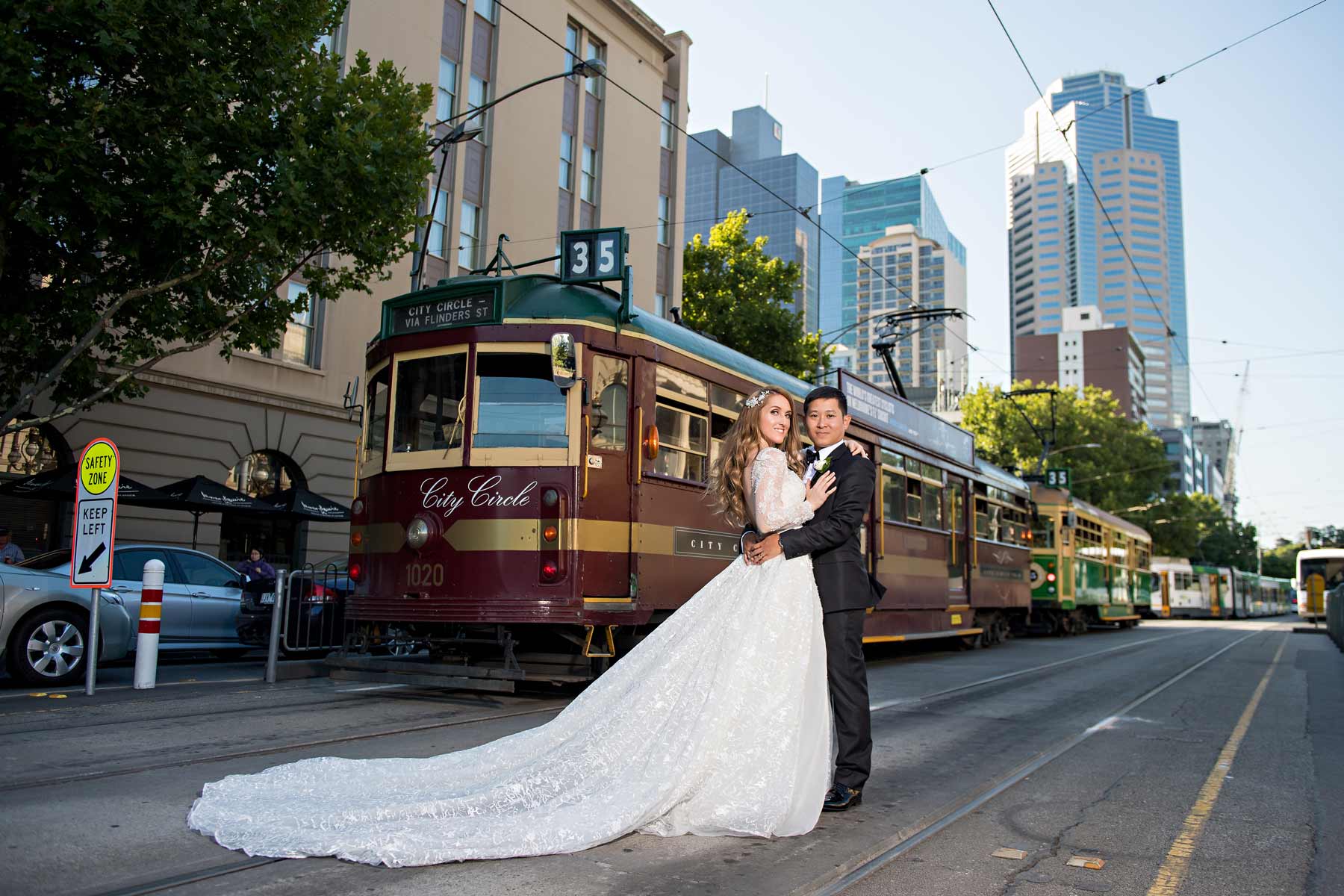 Melina + Vuong RC Real Bride Wearing Demetrios Platinum Wedding dress in 'Analisa'