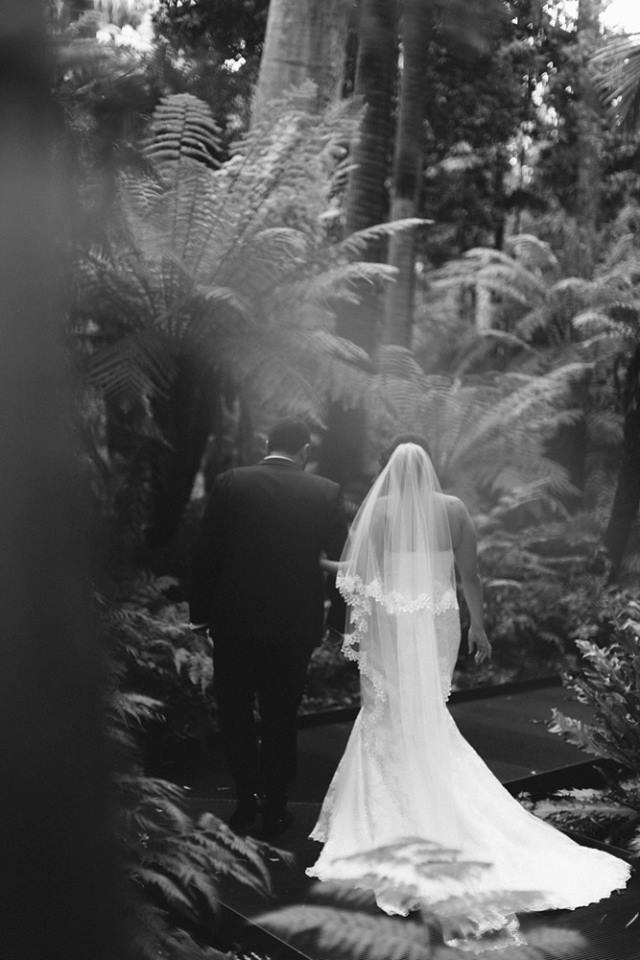 real bride wears mullet wedding dress by la sposa