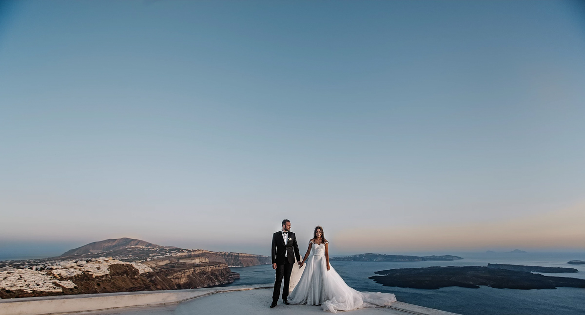 real bride wears Pronovias wedding dress for destination wedding in Santorini Greece