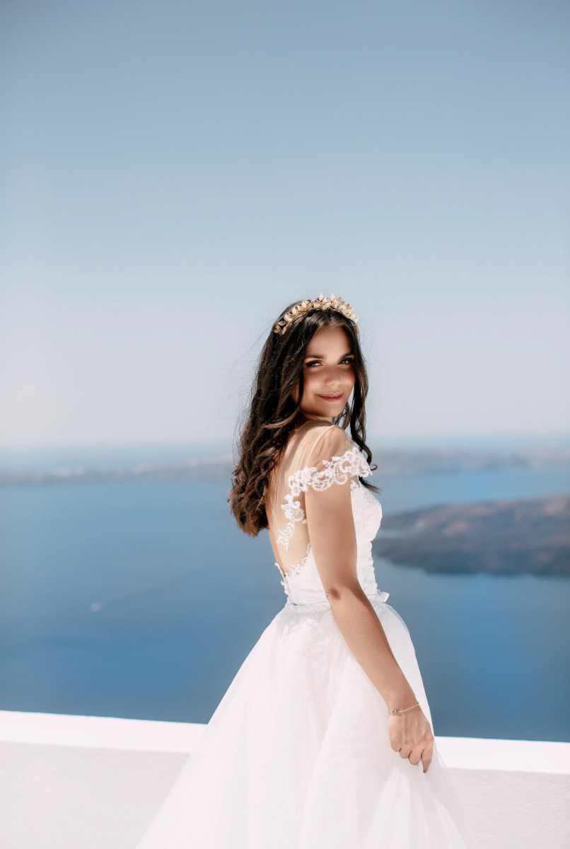 real bride wears Pronovias wedding dress for destination wedding in Santorini Greece