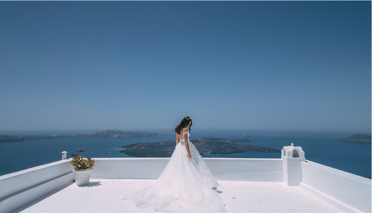 real bride wears Pronovias wedding dress for destination wedding in Santorini Greece