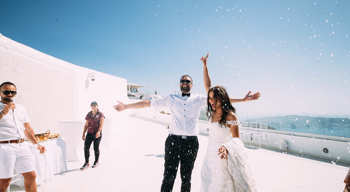 real bride wears Pronovias wedding dress for destination wedding in Santorini Greece