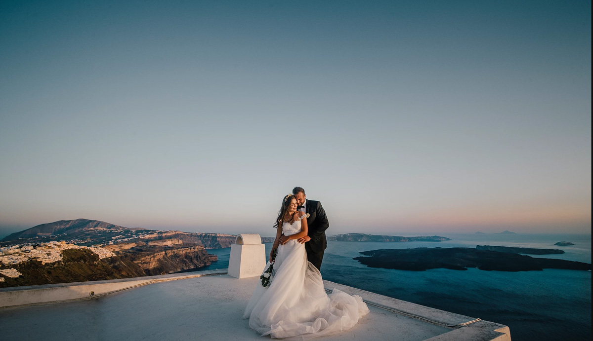 real bride wears Pronovias wedding dress for destination wedding in Santorini Greece