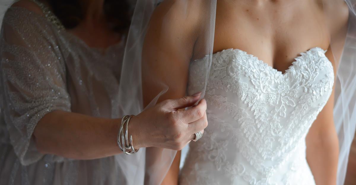 Close up wedding photo of real bride michelle wearing Beca by Pronovias wedding dress