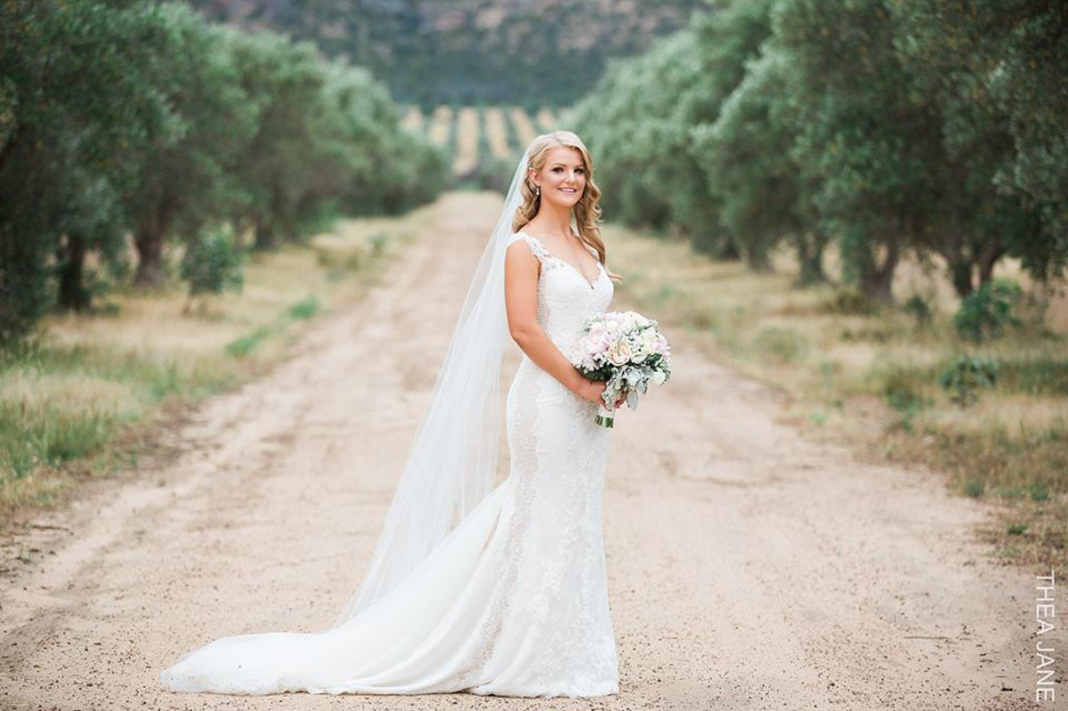 real bride wears tamar wedding dress by pronovias