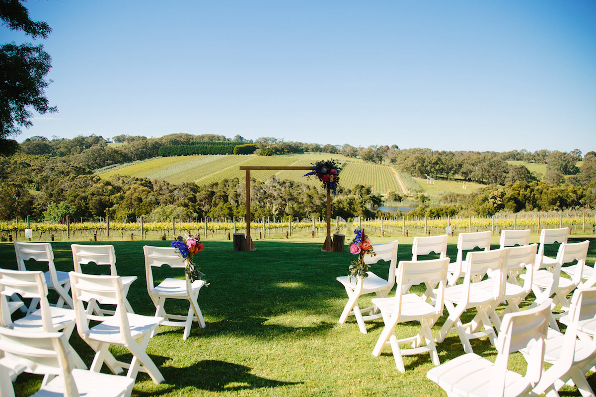 Raffaele Ciuca Real Bride Jessica married Jarrod in a satin, v-neck, a-line ball gown from Raffaele Ciuca Bridal for her winery wedding. Photography by Perla. Melbourne, Australia