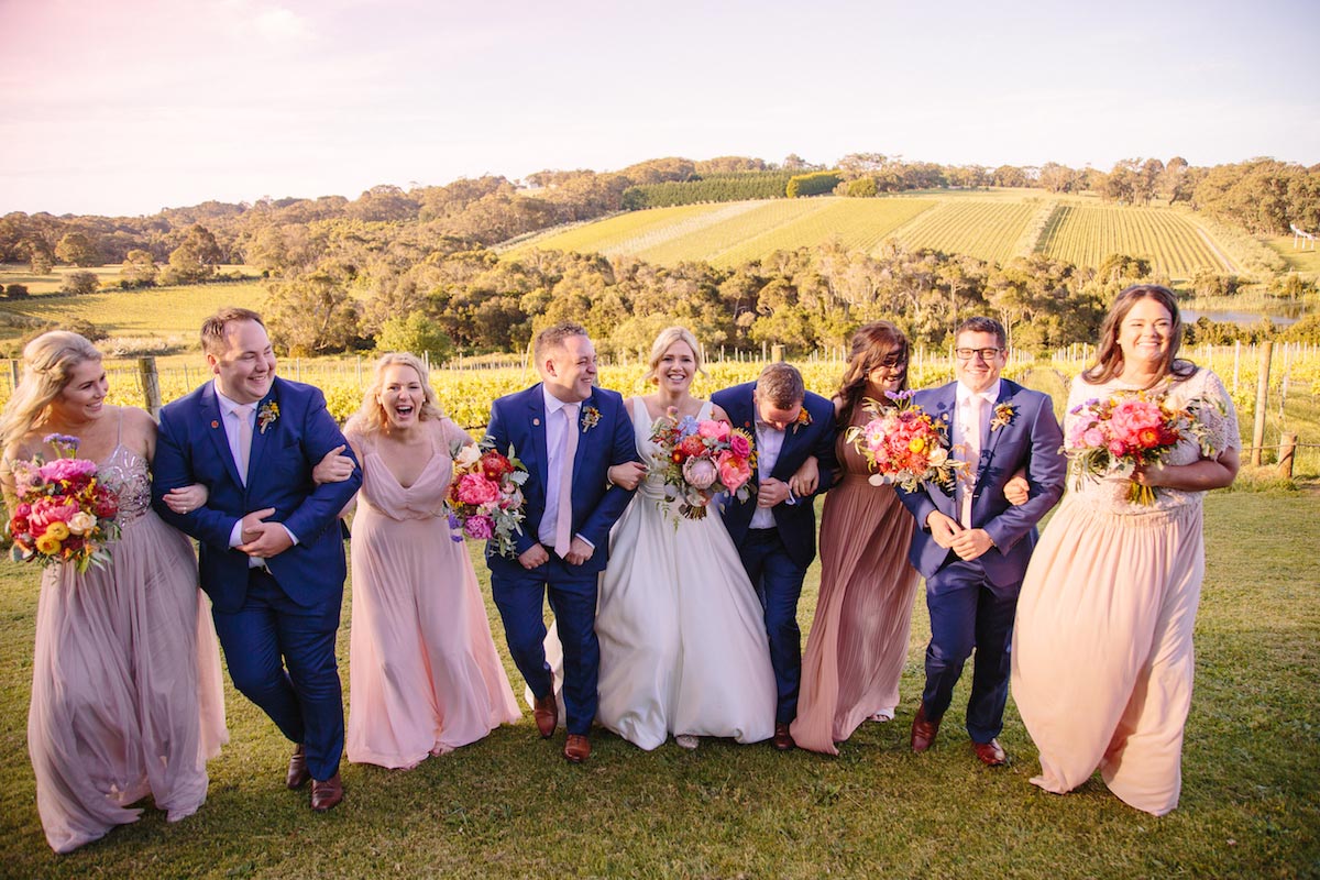 Raffaele Ciuca Real Bride Jessica married Jarrod in a satin, v-neck, a-line ball gown from Raffaele Ciuca Bridal for her winery wedding. Photography by Perla. Melbourne, Australia