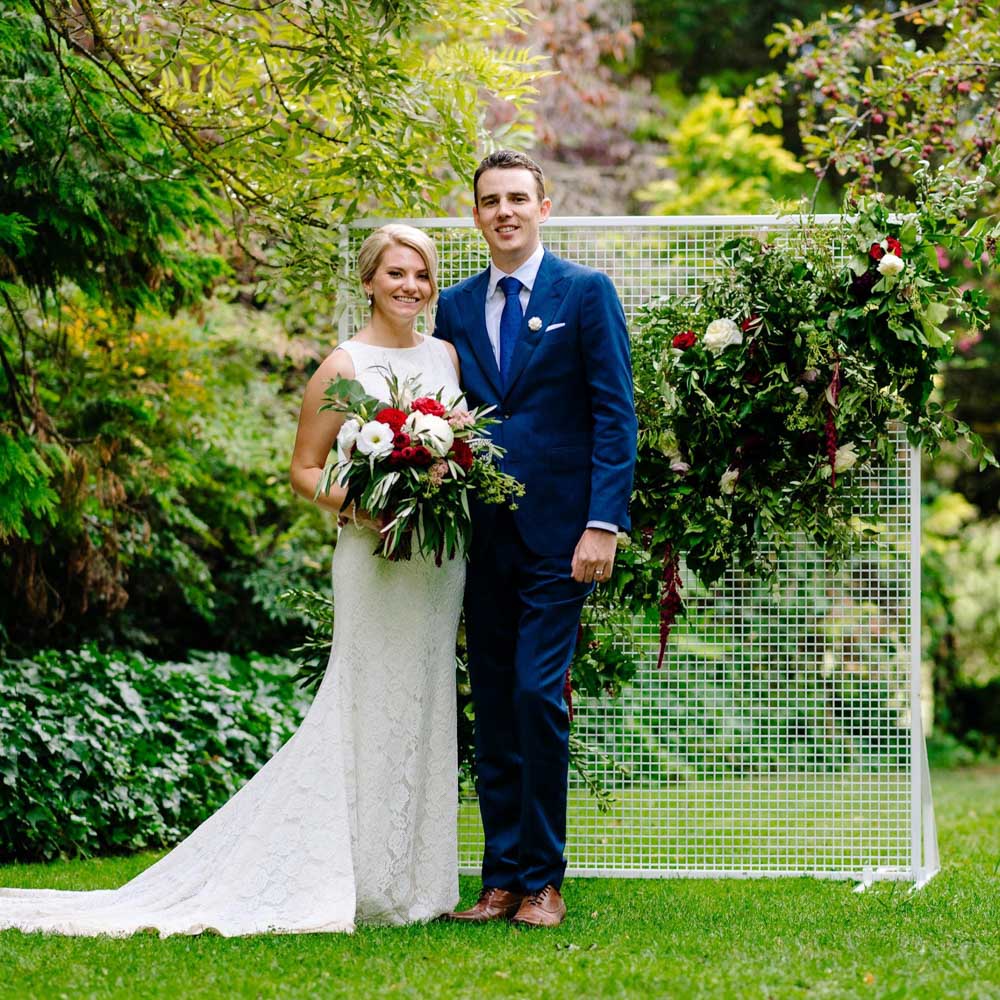 Raffaele Ciuca real bride wearing Ornani wedding dress by Pronovias, groom David wearing blue suit
