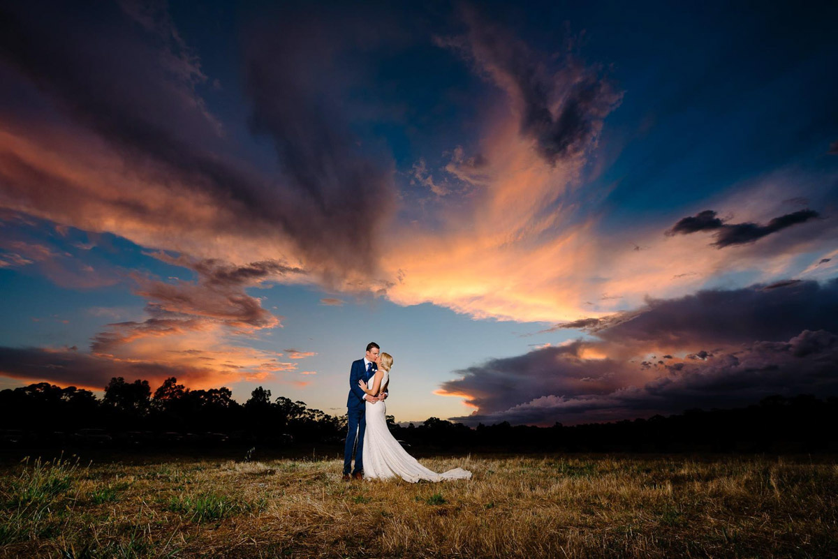 Raffaele Ciuca real bride wearing Ornani wedding dress by Pronovias, sunset photo