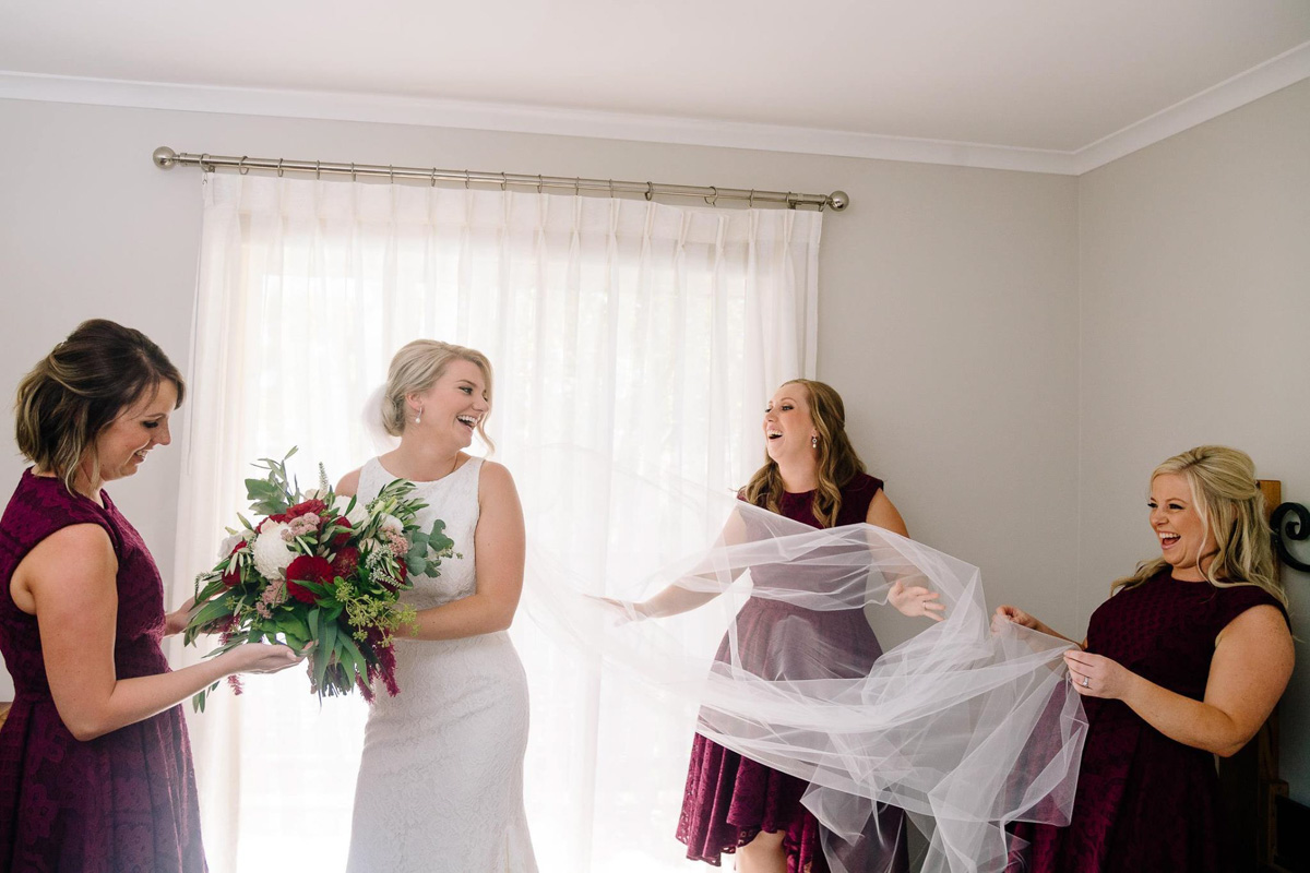 Raffaele Ciuca real bride wearing Ornani wedding dress by Pronovias with long veil